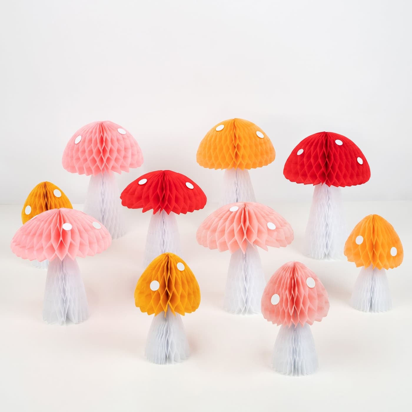 Meri Meri honeycomb mushroom paper decorations in assorted colors