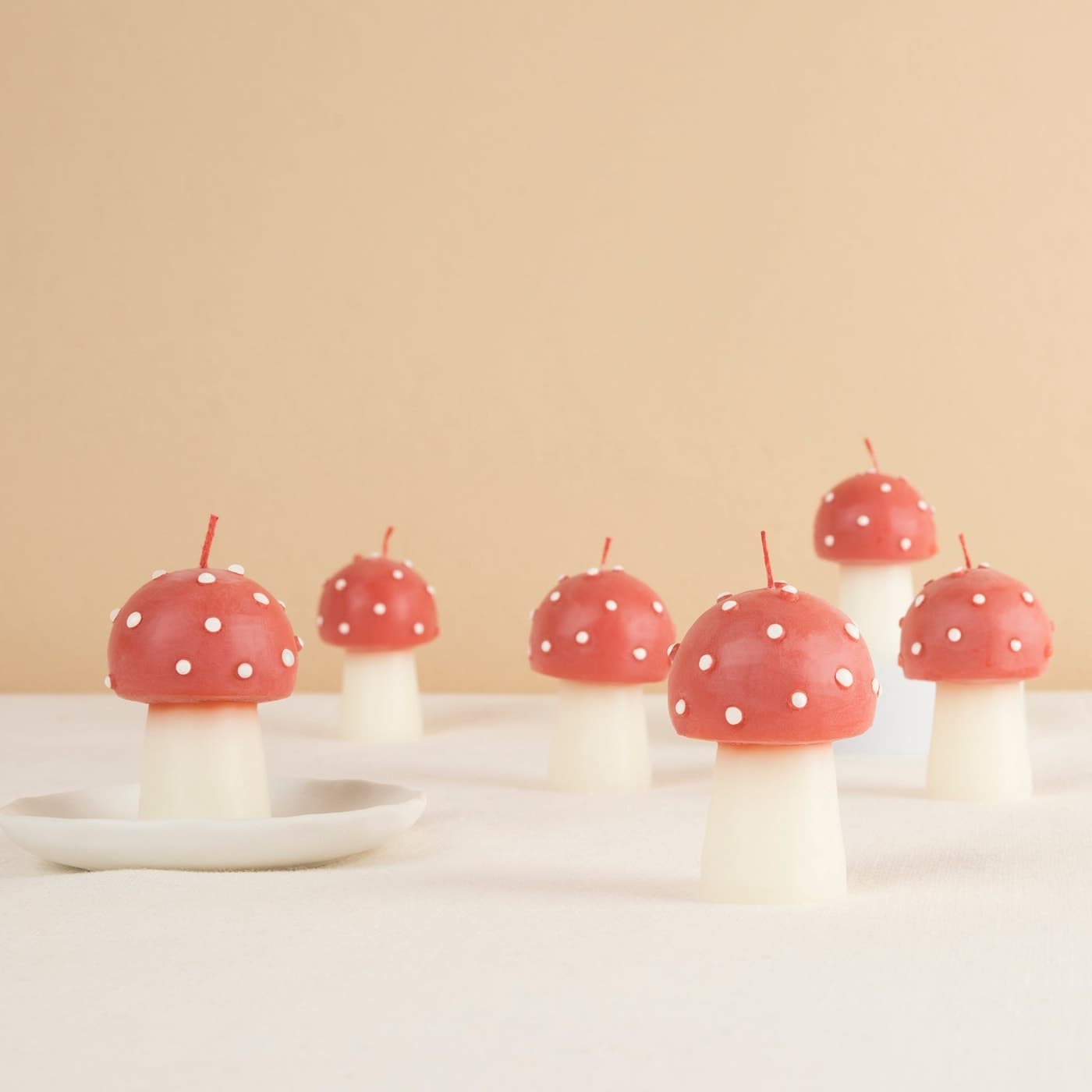 Meri Meri mini mushroom candles with red caps and white dots